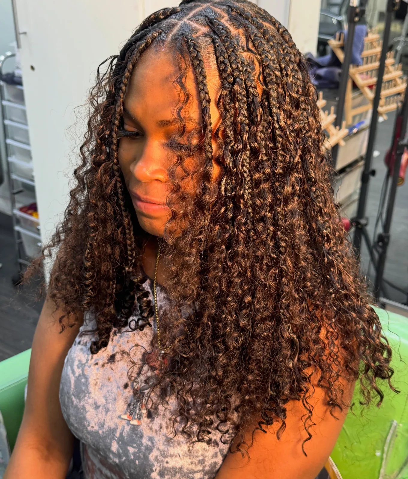 Curly sew-in styled at Miami X Hair & Nail Bar